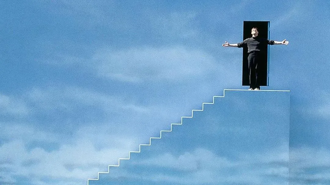 https://storage.tally.so/03b7bb05-8574-4506-996d-67db3ef26414/Still-from-The-Truman-Show-The-Truman-Show-is-a-1997-American-film-directed-by-Peter-Weir-Starring-Jim-Carrey-Ed-Harris-Paul-Giamatti-Laura-Linney.webp