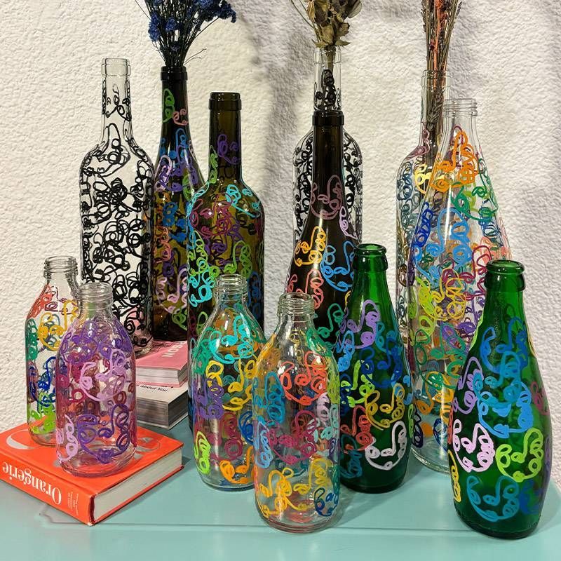 https://storage.tally.so/1a8646f4-d790-4fed-a504-46253acbcbb2/one-line-botellas.jpg
