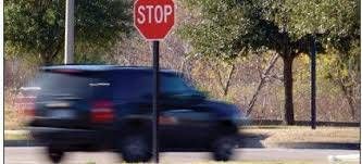 https://storage.tally.so/4f7804c3-8e92-4460-8f53-034d50f6abf7/Not-fully-stopping-at-stop-sign.jpg