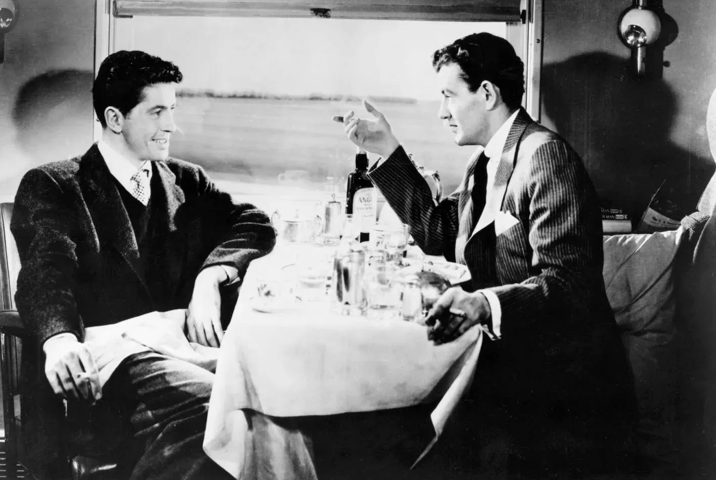 https://storage.tally.so/57c7bcc1-104e-428c-8077-4a5f55c8d3af/Farley-Granger-Robert-Walker-Strangers-on-a.webp