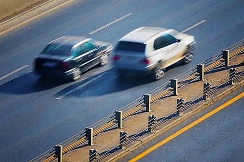 https://storage.tally.so/6388498a-7e63-4409-8602-f864e46920d1/Driving-the-same-speed-side-by-side-on-the-highway.jpg