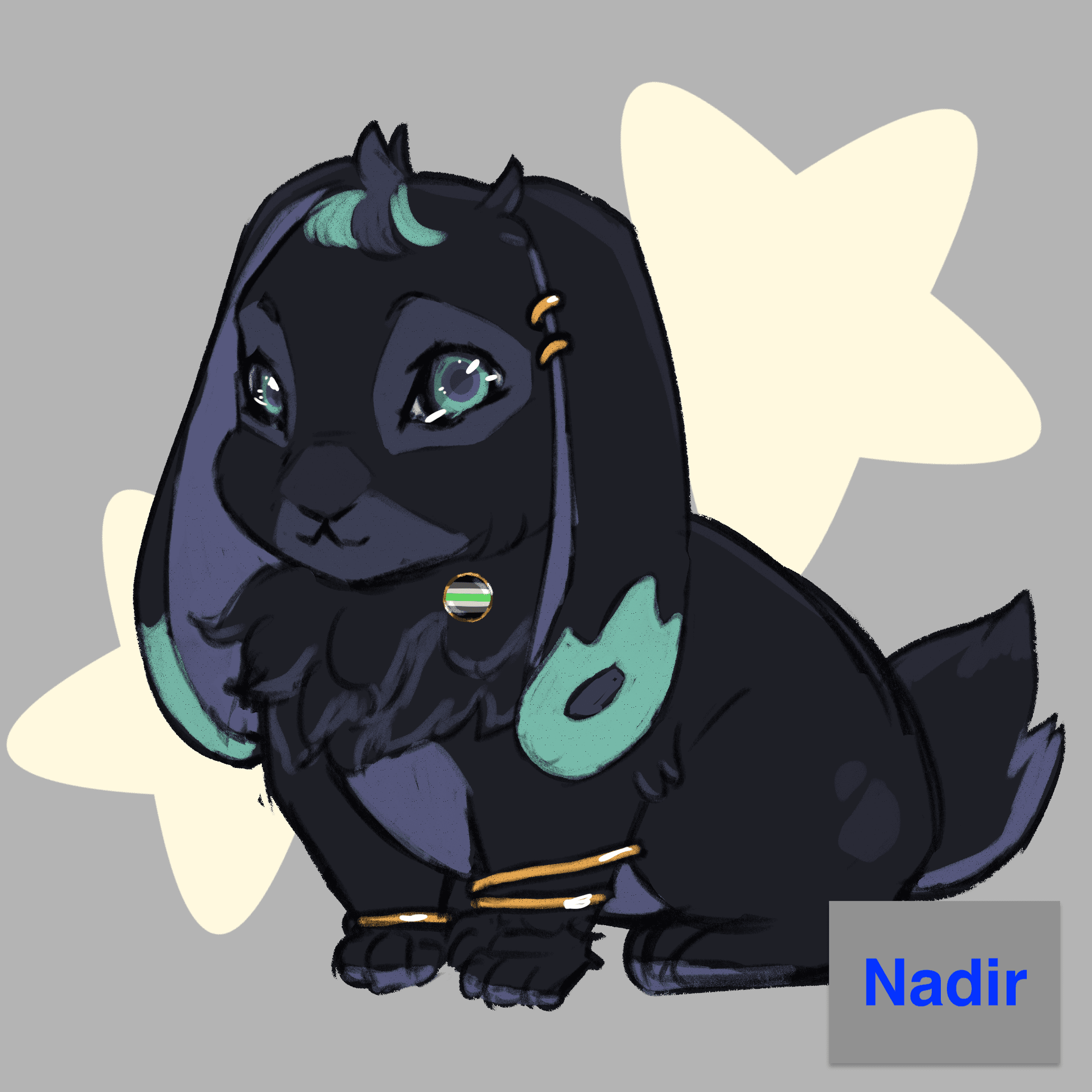 A dark long eared bunny with blue spots and golden bands and earrings