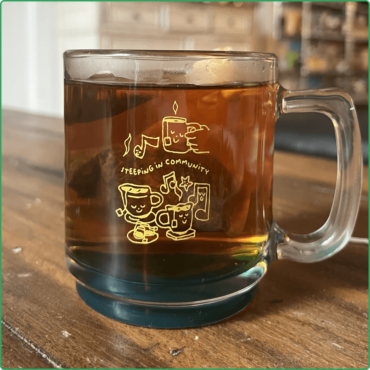 THE MUG! It's 9oz, glass, and has a green tinted bottom :)