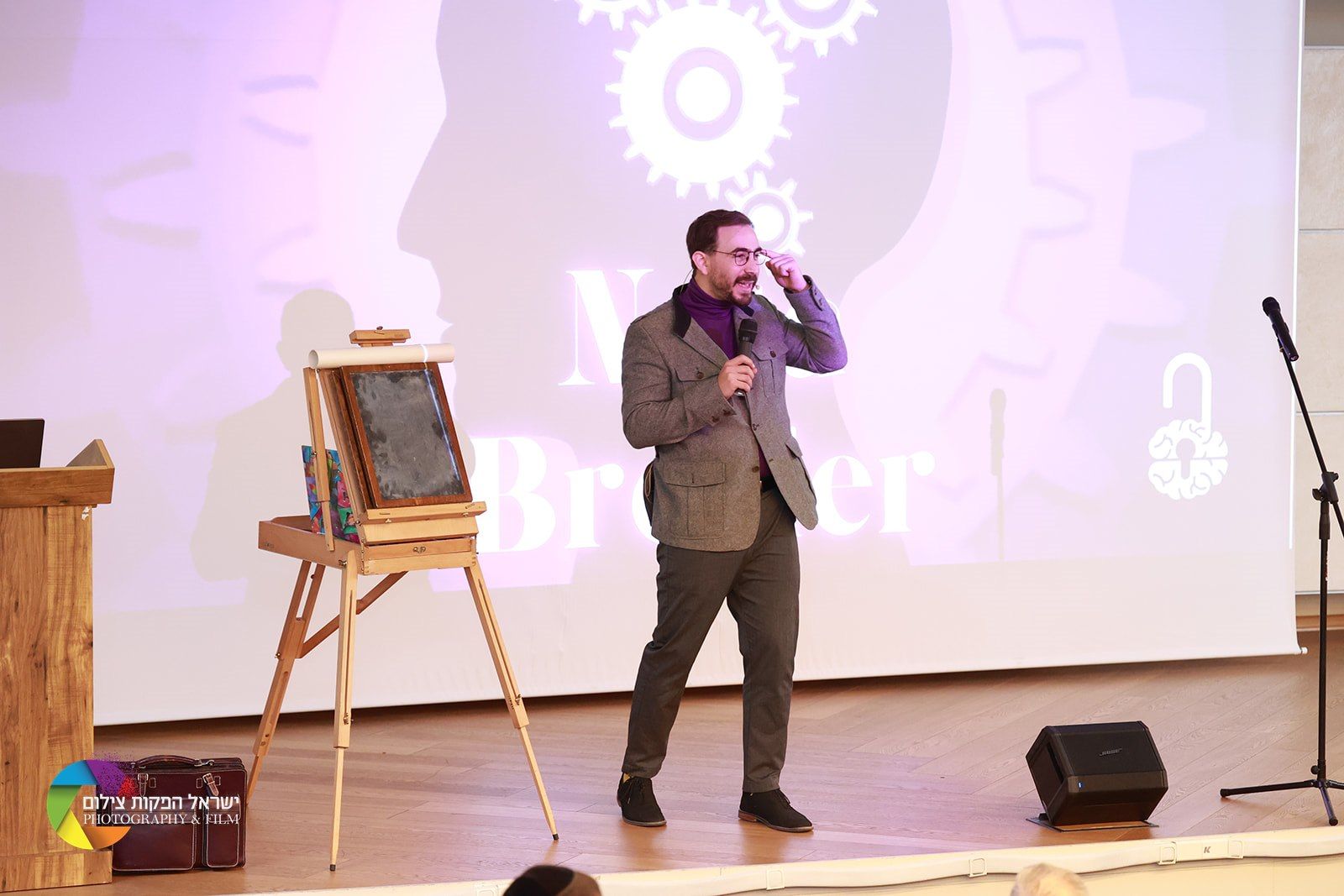 Performing photo of magician Neta Bresler