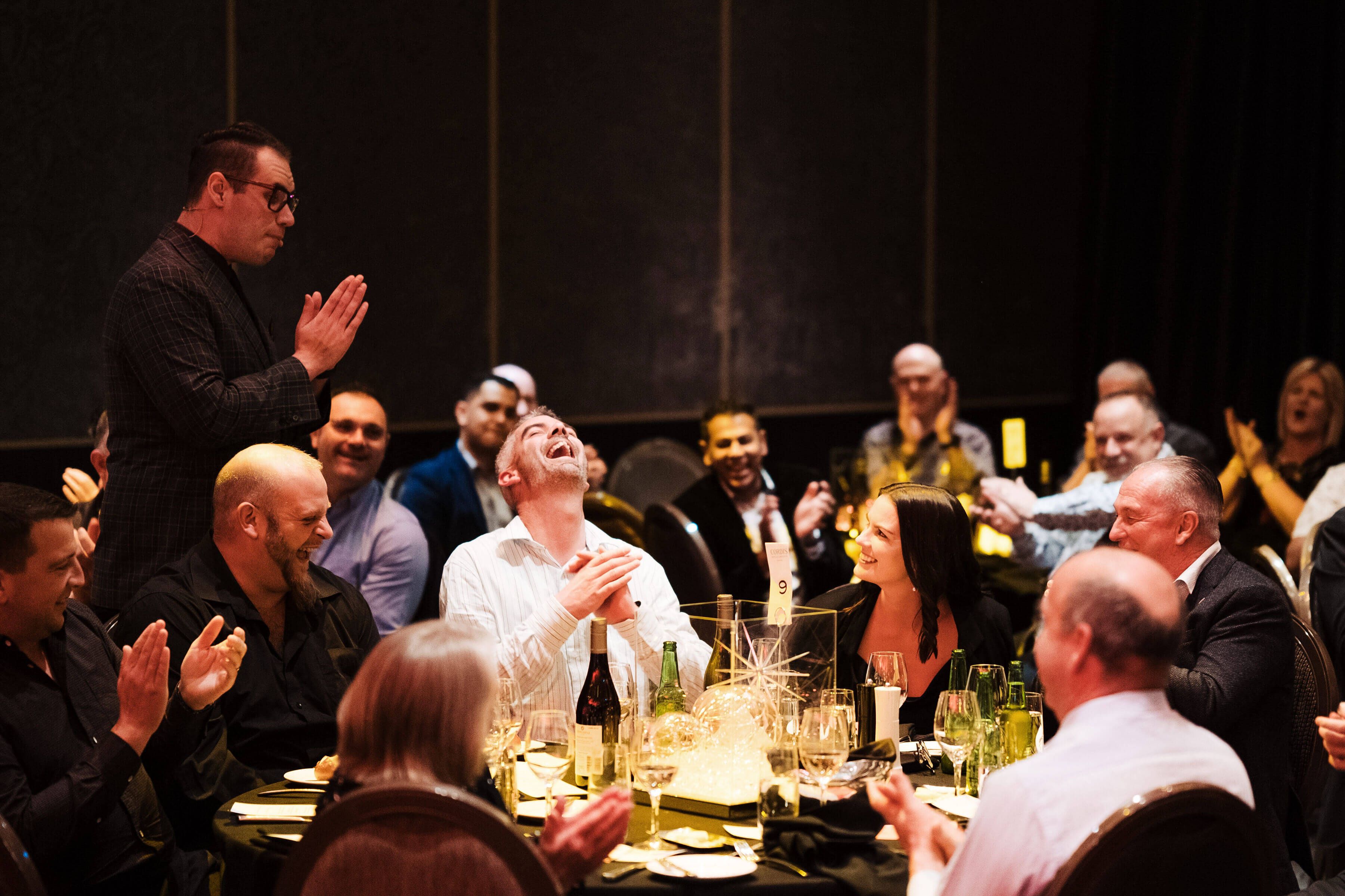 Performing photo of magician Brendan Dooley