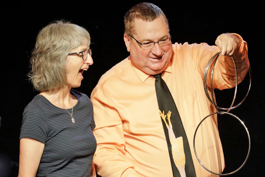 Performing photo of magician Greg Wood