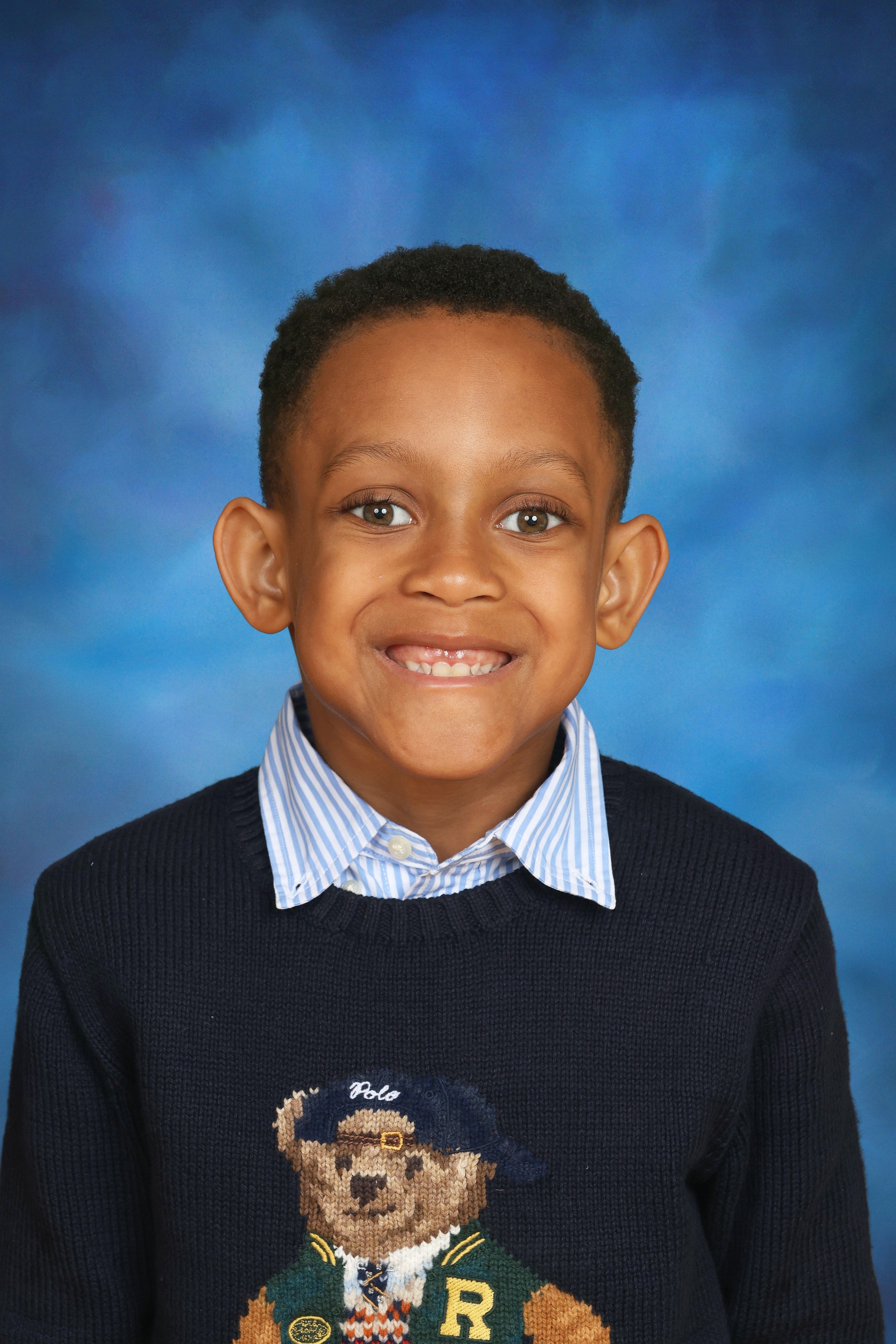 Grayson is 9 years old and loves reading Dog Man, drawing, building with LEGO, playing video games, and traveling with his family. His favorite color is blue, pizza is his favorite food, and he enjoys using his imagination to create fun stories and adventures.