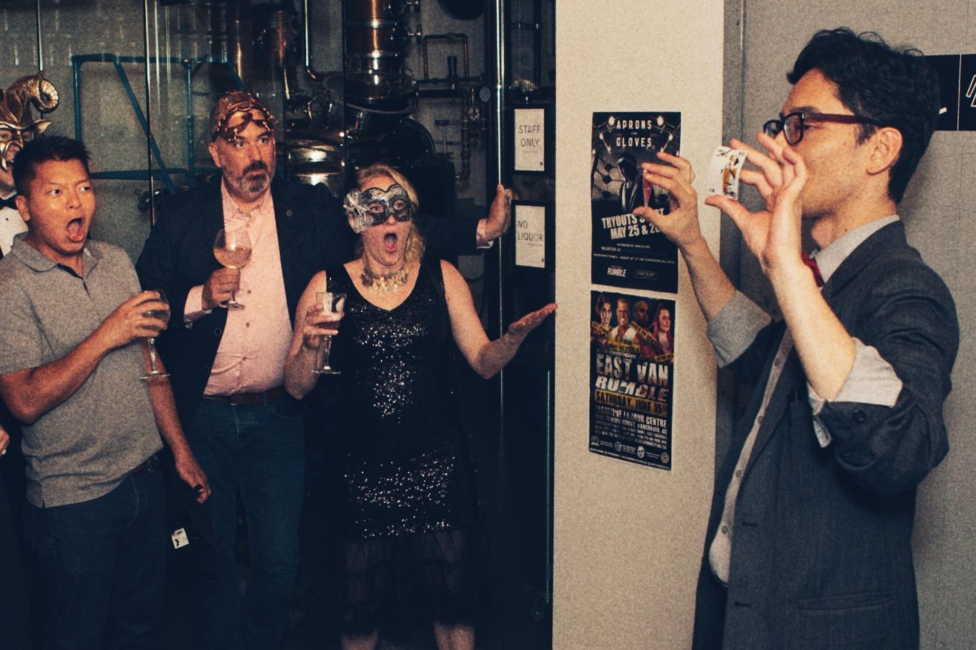 Performing photo of magician Travis Bernhardt