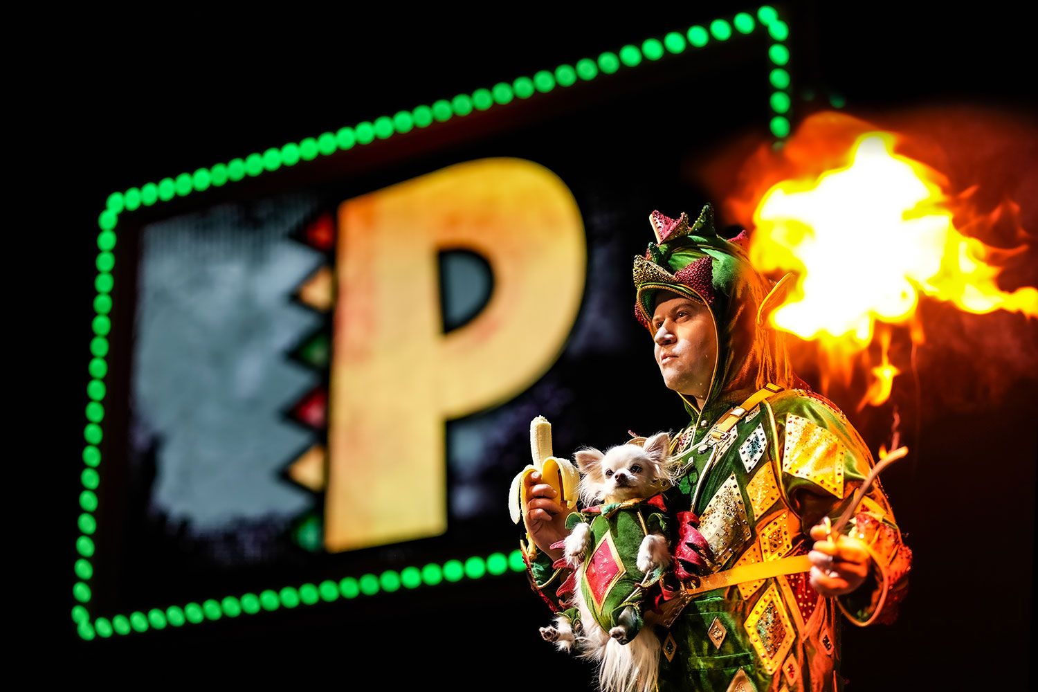 Performing photo of magician Piff the Magic Dragon