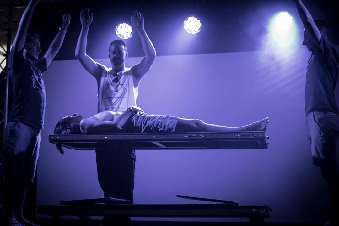 Performing photo of magician Robbie Kay